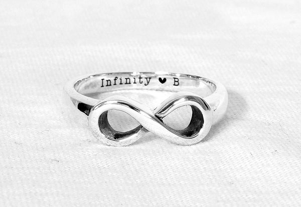 Silver ring, infinity sign with zirkonia stones